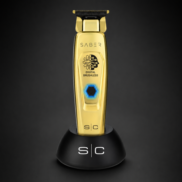 StyleCraft Saber Gold professional hair trimmer with charging stand